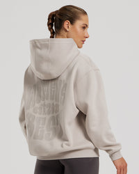 Comfort Oversized Statement Graphic Hoodie | Stone